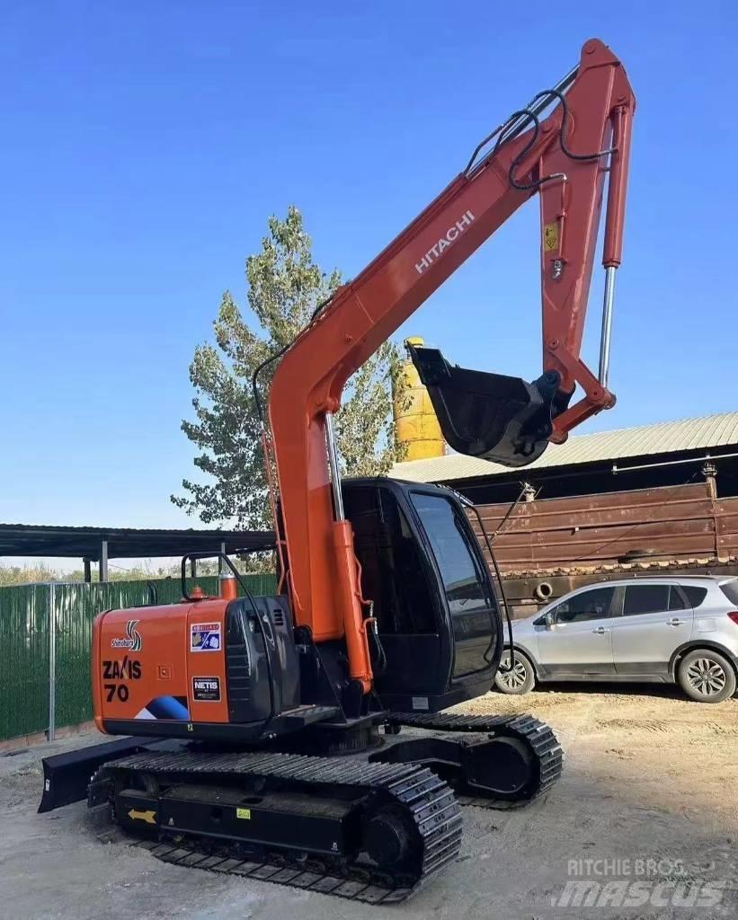 Hitachi 70 Гусеничні екскаватори