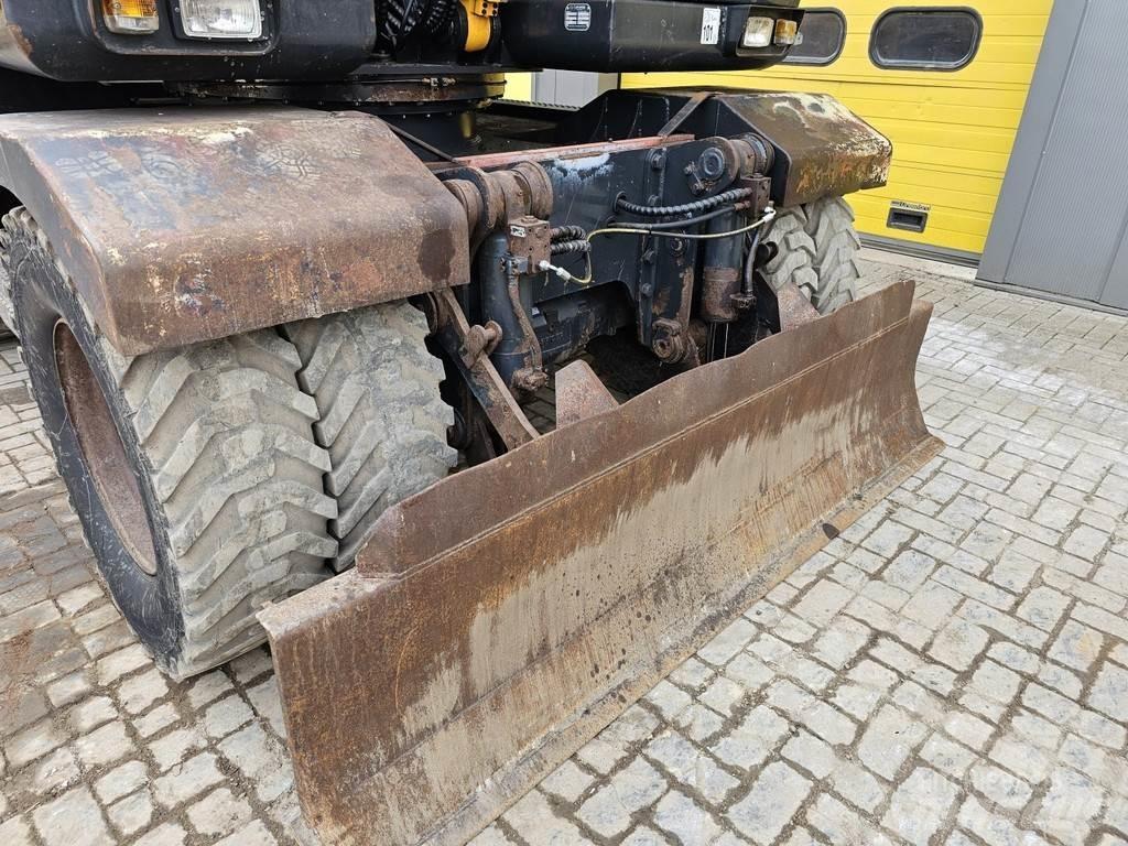 Hyundai R140W-7A Колісні екскаватори