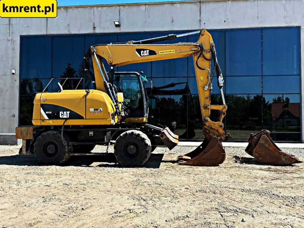 CAT M 313 D Колісні екскаватори