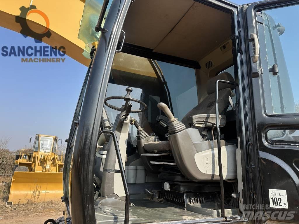 CAT M320D Колісні екскаватори