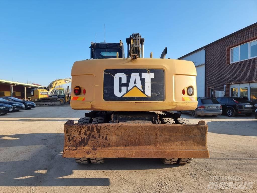 CAT M 316 D II Колісні екскаватори