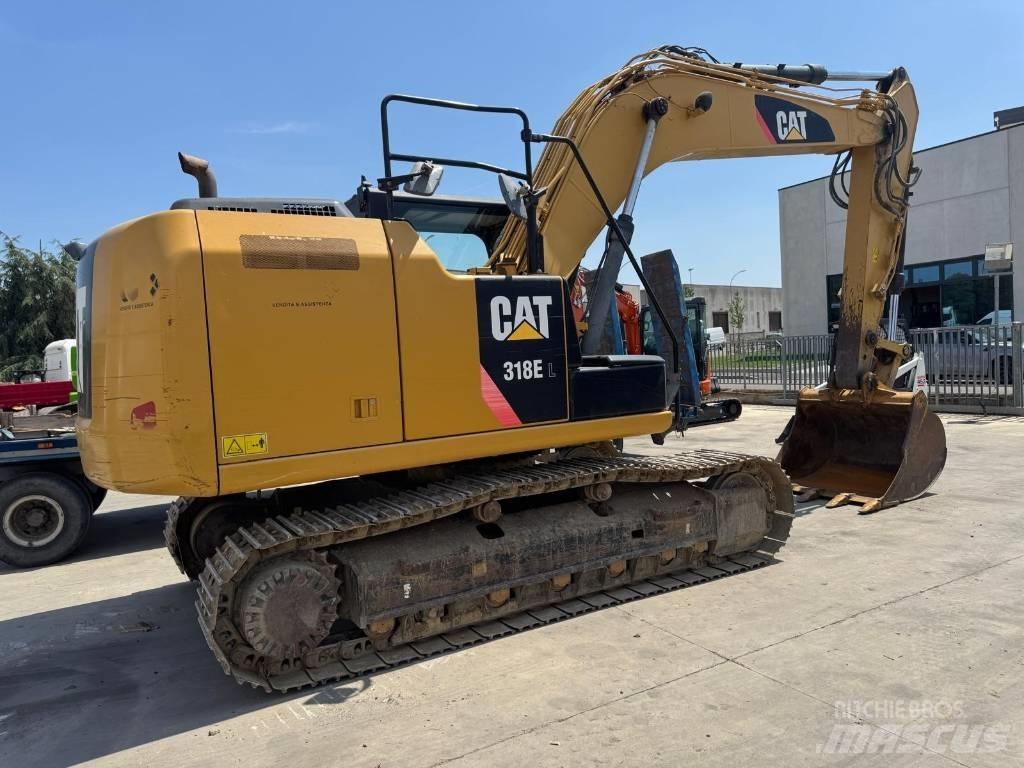 CAT 318E Гусеничні екскаватори