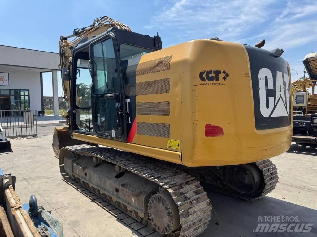 CAT 318E Гусеничні екскаватори