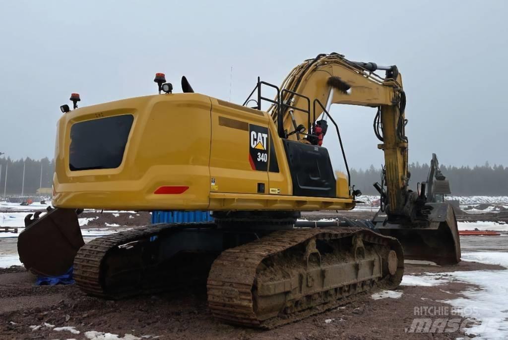 CAT 340 Гусеничні екскаватори