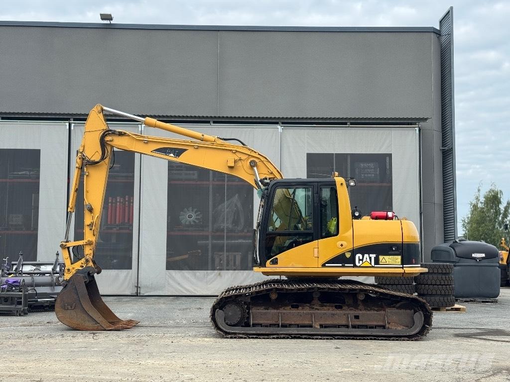 CAT 312 C Гусеничні екскаватори