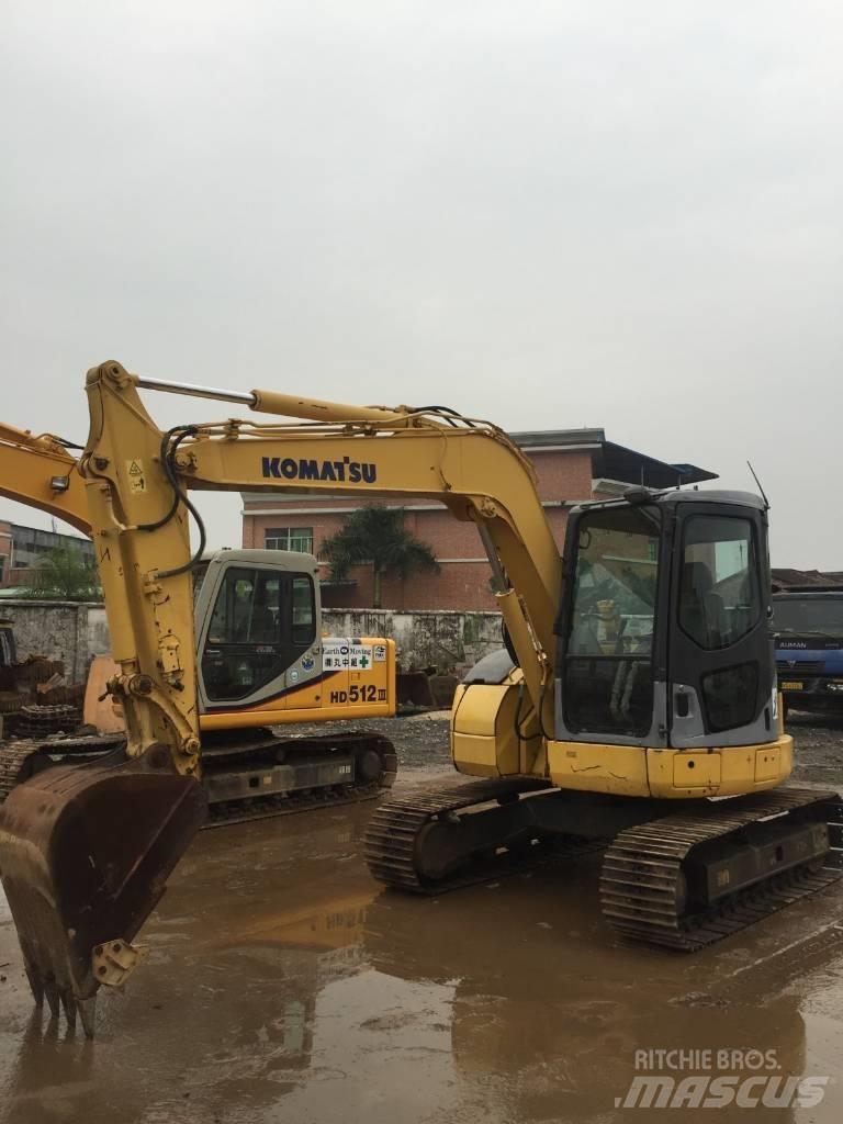 Komatsu pc78us Середні екскаватори 7т. - 12т.