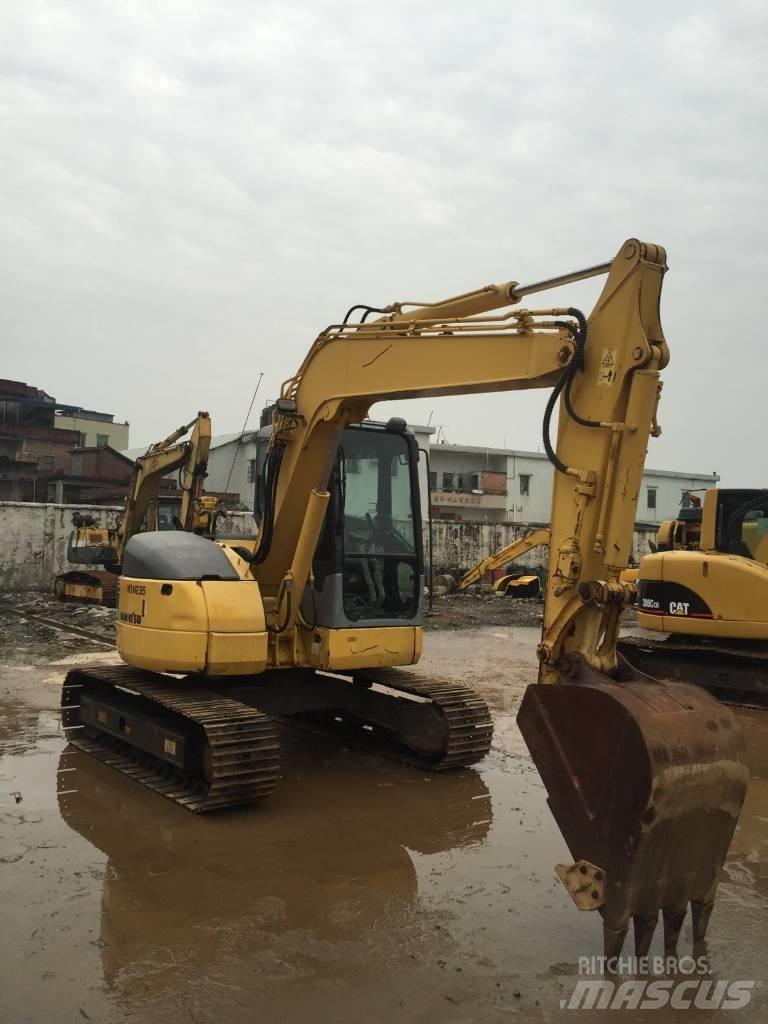 Komatsu pc78us Середні екскаватори 7т. - 12т.