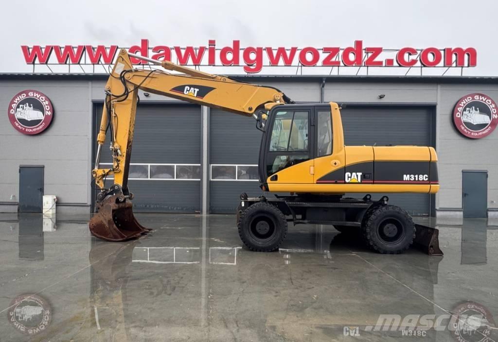 CAT M 318 C Колісні екскаватори