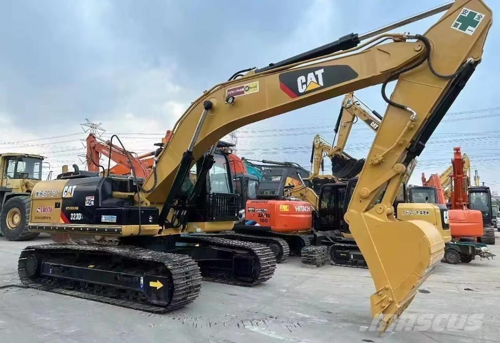 CAT 323 D Гусеничні екскаватори