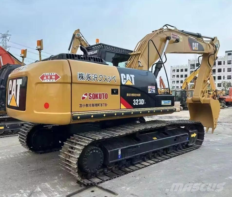 CAT 323 D Гусеничні екскаватори