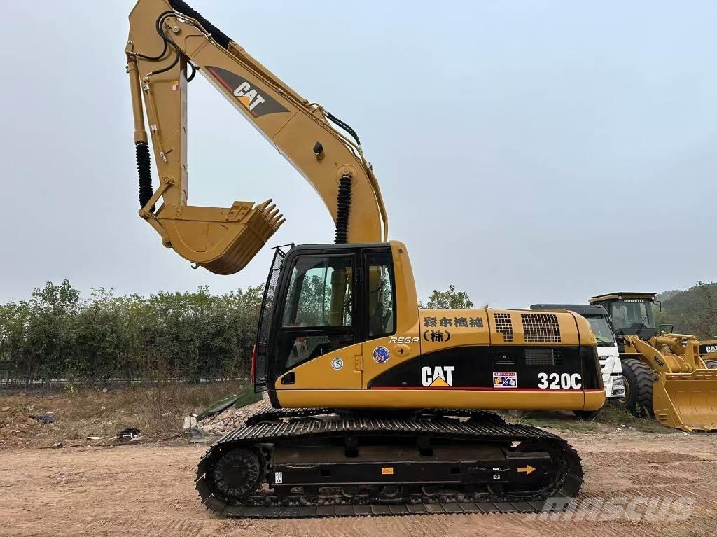 CAT 320 C Гусеничні екскаватори