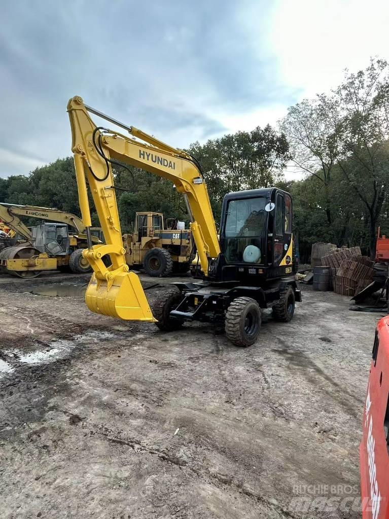 Hyundai R60-7 Колісні екскаватори