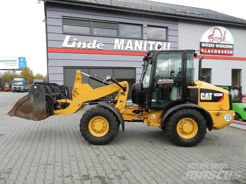 CAT ( CAT ) 906M Фронтальні навантажувачі