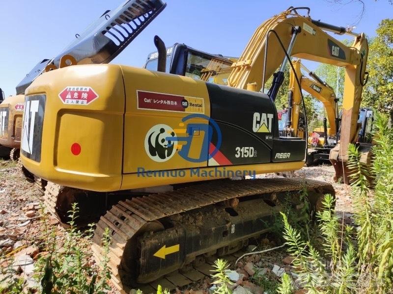 CAT 315D2 Середні екскаватори 7т. - 12т.