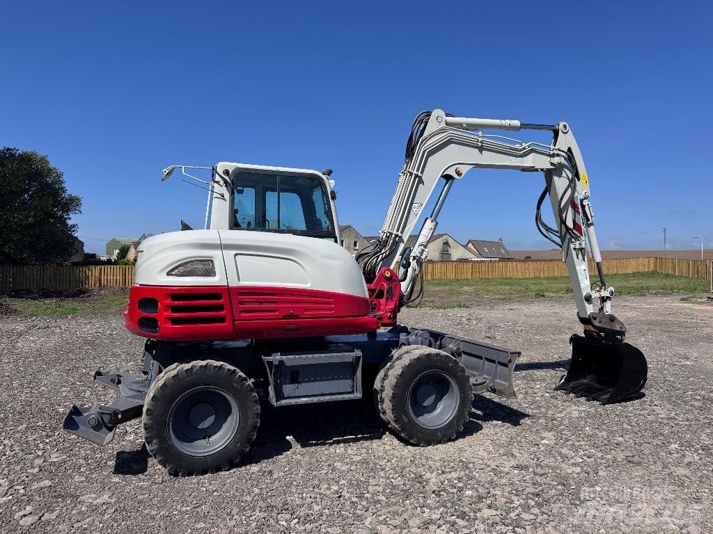Takeuchi TB 295 W Колісні екскаватори