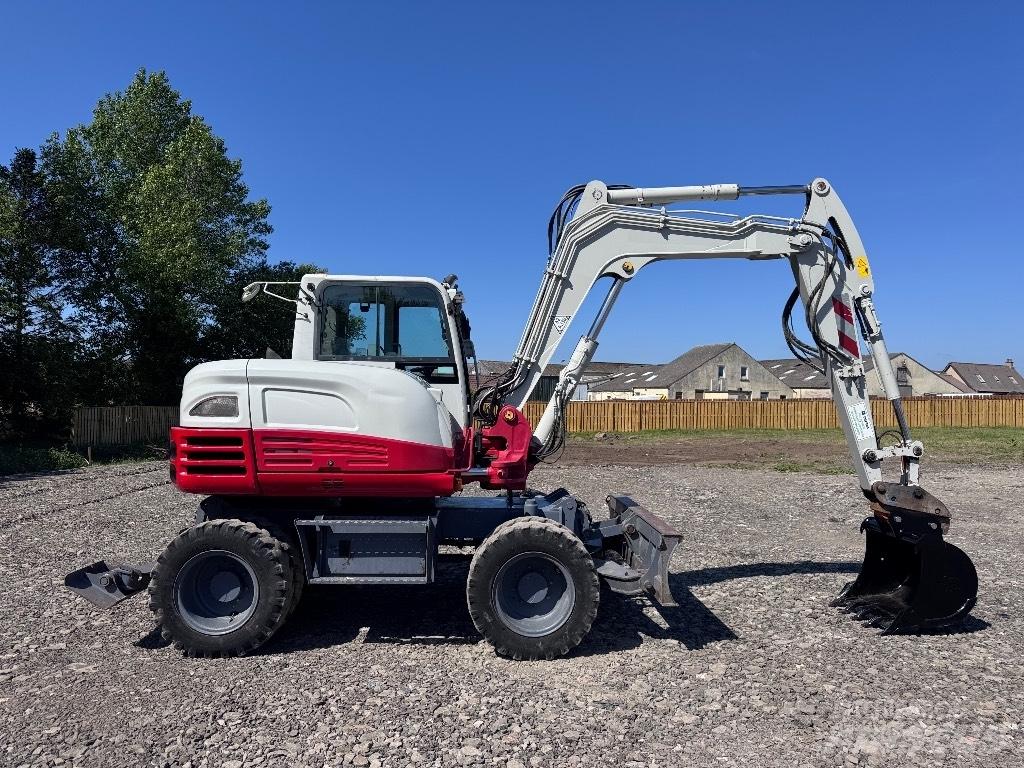 Takeuchi TB 295 W Колісні екскаватори