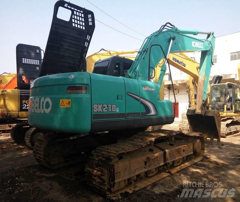 Kobelco SK 210 Гусеничні екскаватори