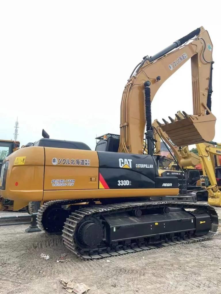 CAT 330 Гусеничні екскаватори