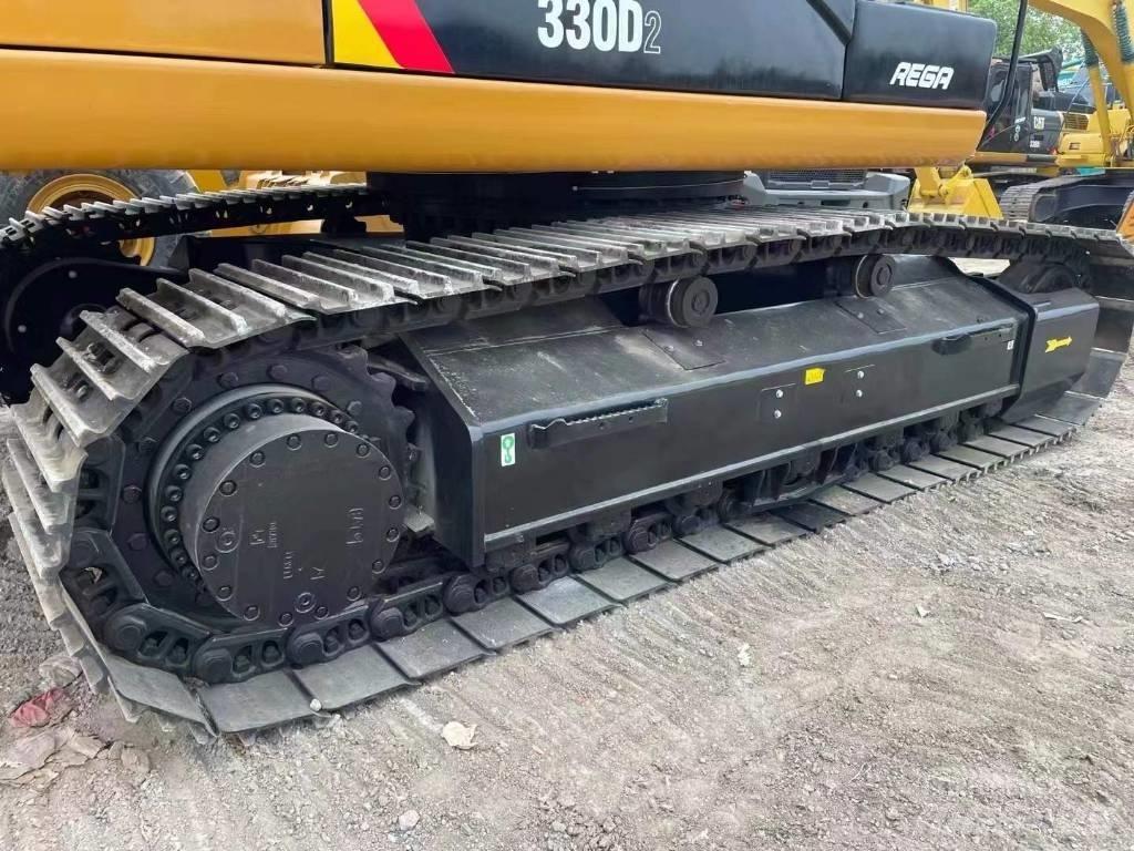 CAT 330 Гусеничні екскаватори