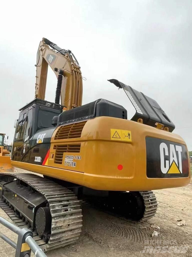 CAT 330 Гусеничні екскаватори