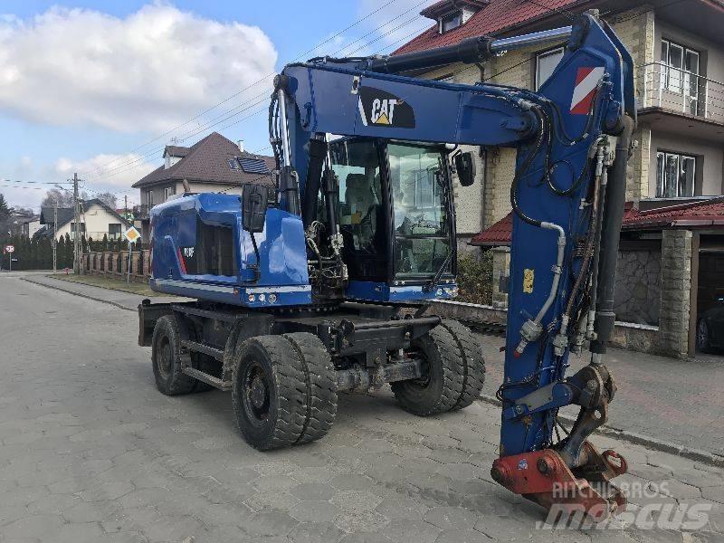 CAT M318f 318 f Колісні екскаватори