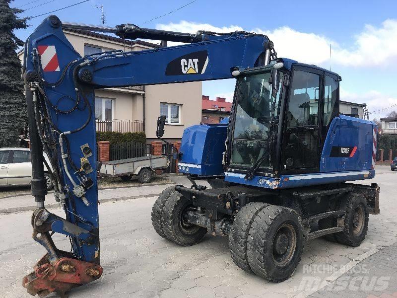 CAT M318f 318 f Колісні екскаватори