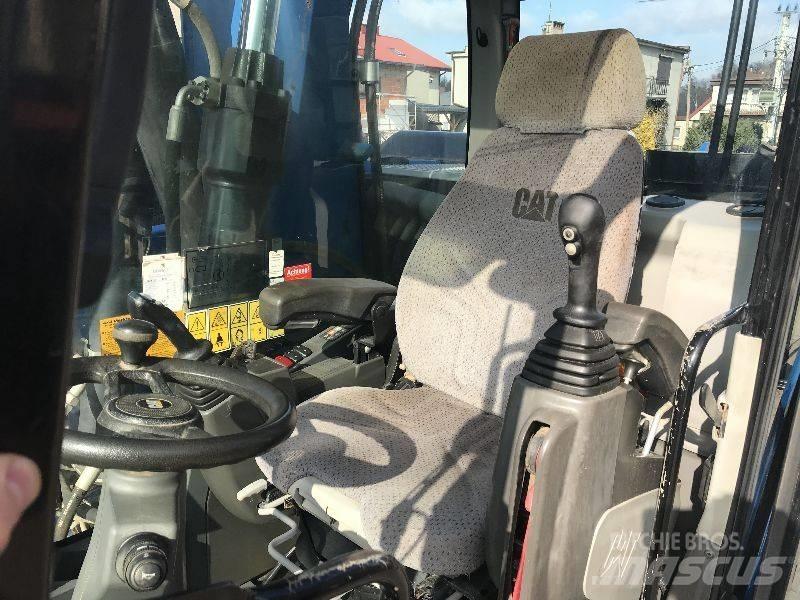 CAT M318f 318 f Колісні екскаватори