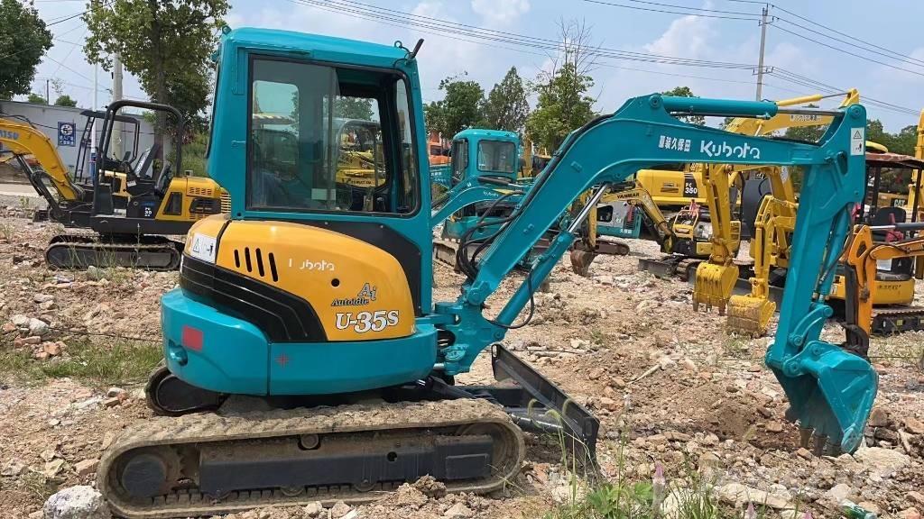 Komatsu U35 Міні-екскаватори < 7т