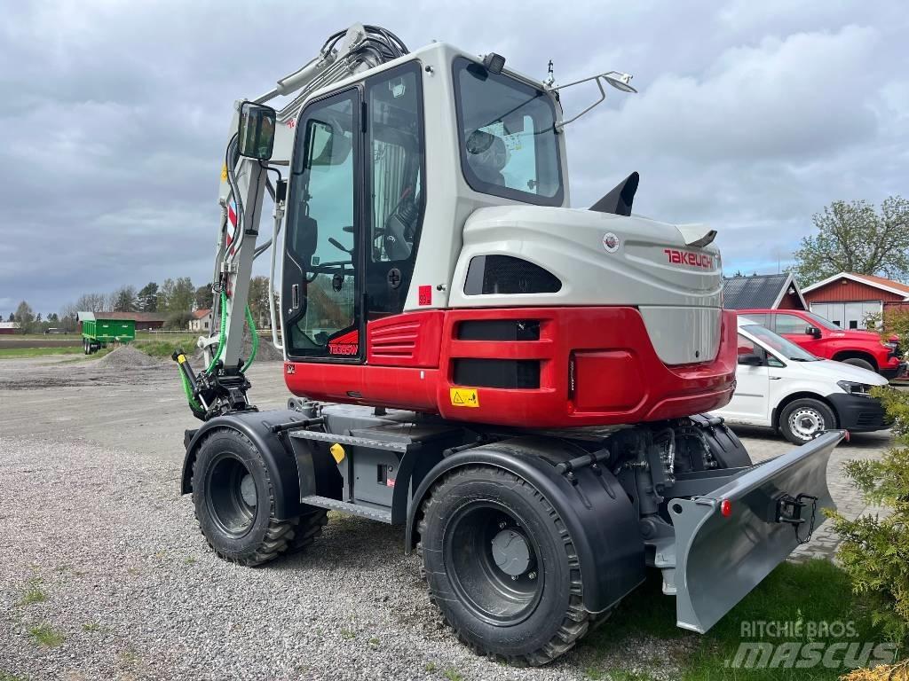 Takeuchi TB 395 W Колісні екскаватори