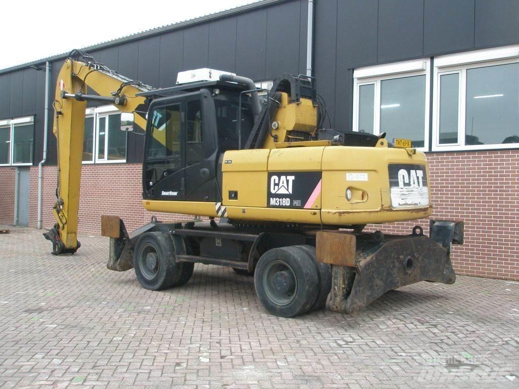 CAT M318D Колісні екскаватори