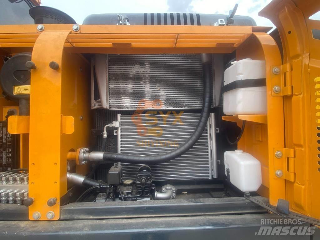 Hyundai Robex 220 Гусеничні екскаватори