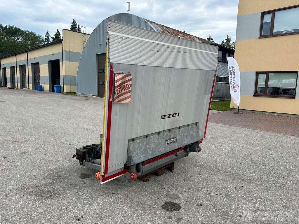 Dhollandia  Автопідйомники для товарів і меблів