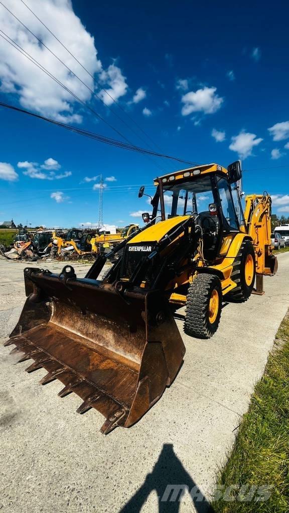 CAT 428 C Екскаватори-навантажувачі