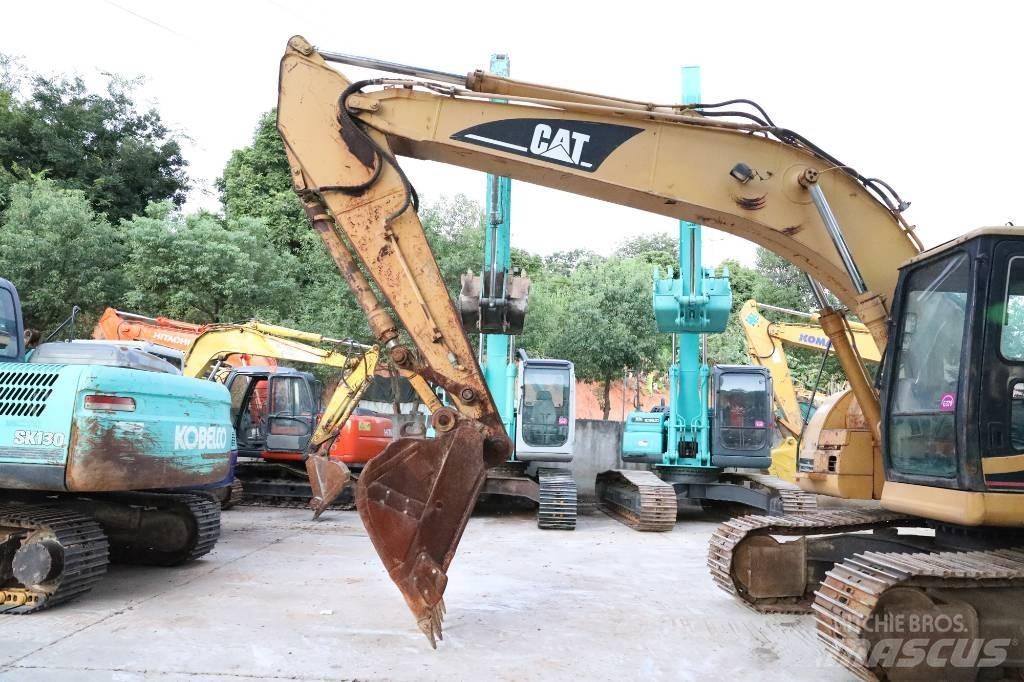 CAT 320BU Гусеничні екскаватори