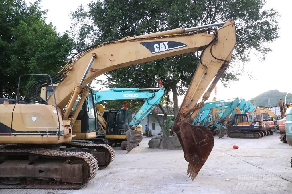 CAT 320BU Гусеничні екскаватори