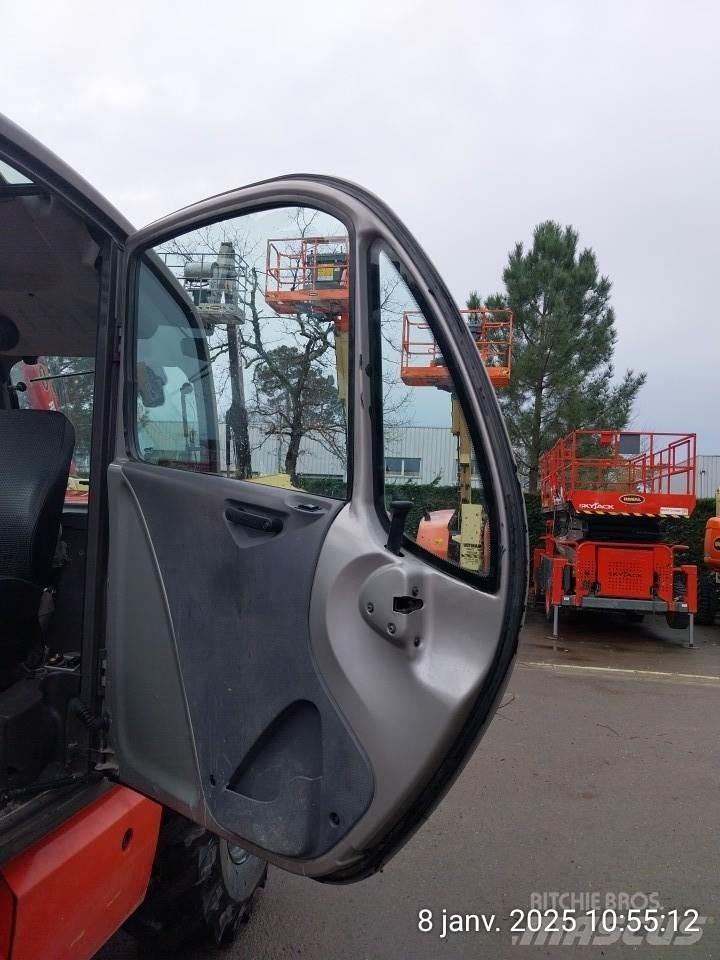 Manitou MT1440 Телескопічні навантажувачі