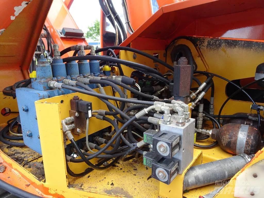 Mecalac 12MXT Колісні екскаватори