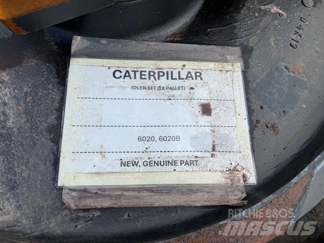 CAT 6020 NEW IDLER Гусениці