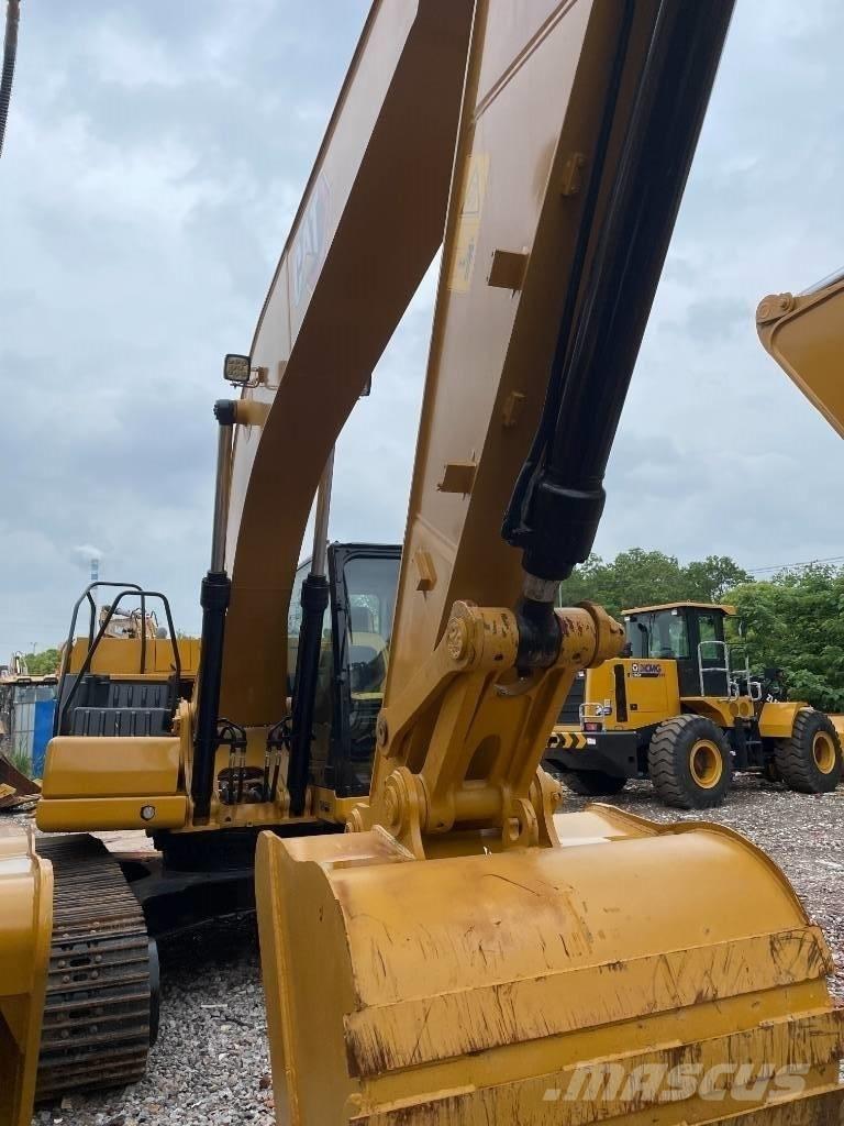 CAT 323GX Середні екскаватори 7т. - 12т.