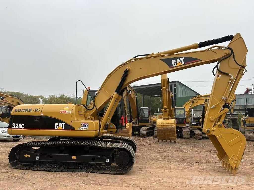 CAT 320C Гусеничні екскаватори