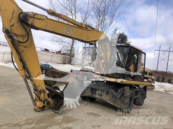 CAT M318 Колісні екскаватори