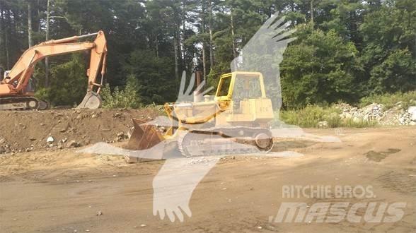 John Deere 855 Гусеничні вантажники