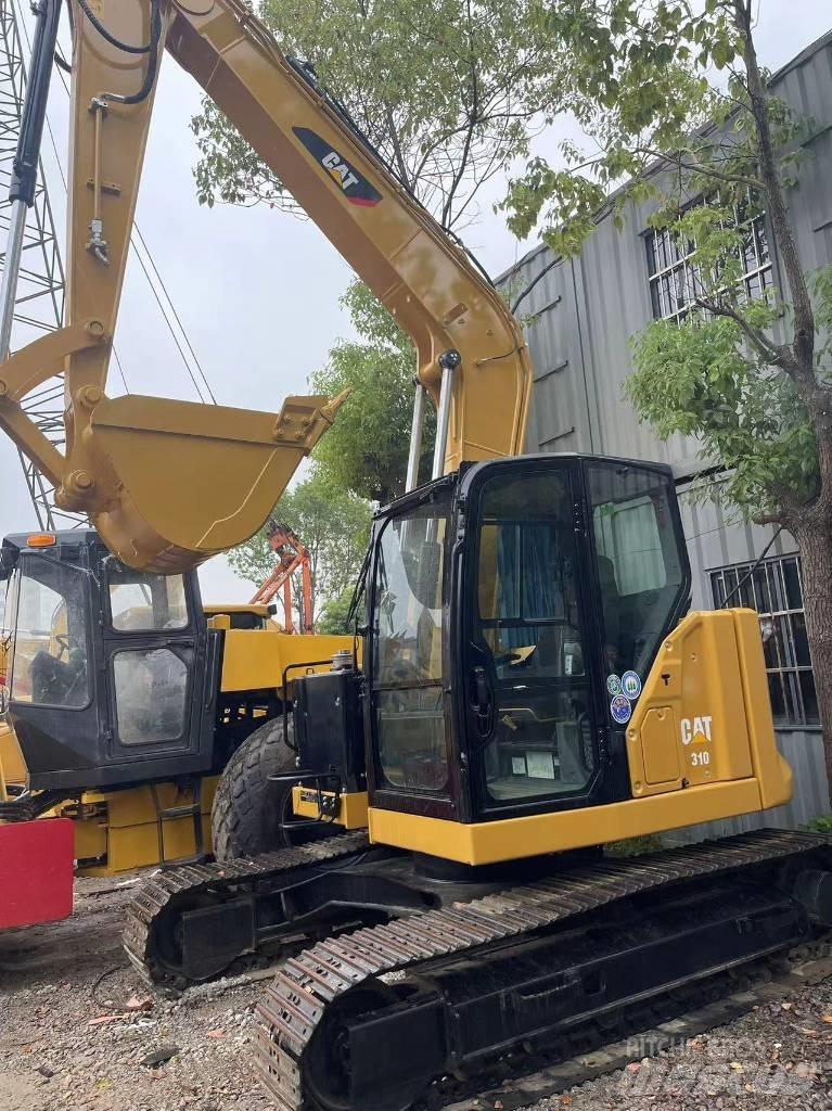 CAT 310 Гусеничні екскаватори