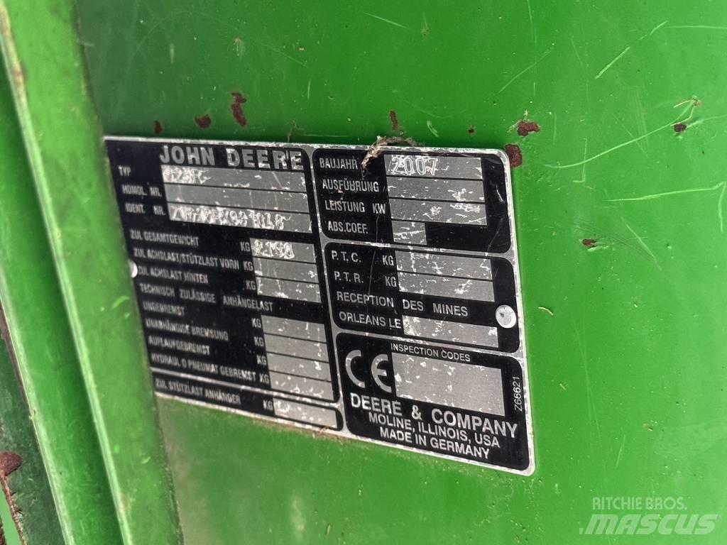 John Deere T 560 i Зернозбиральні комбайни