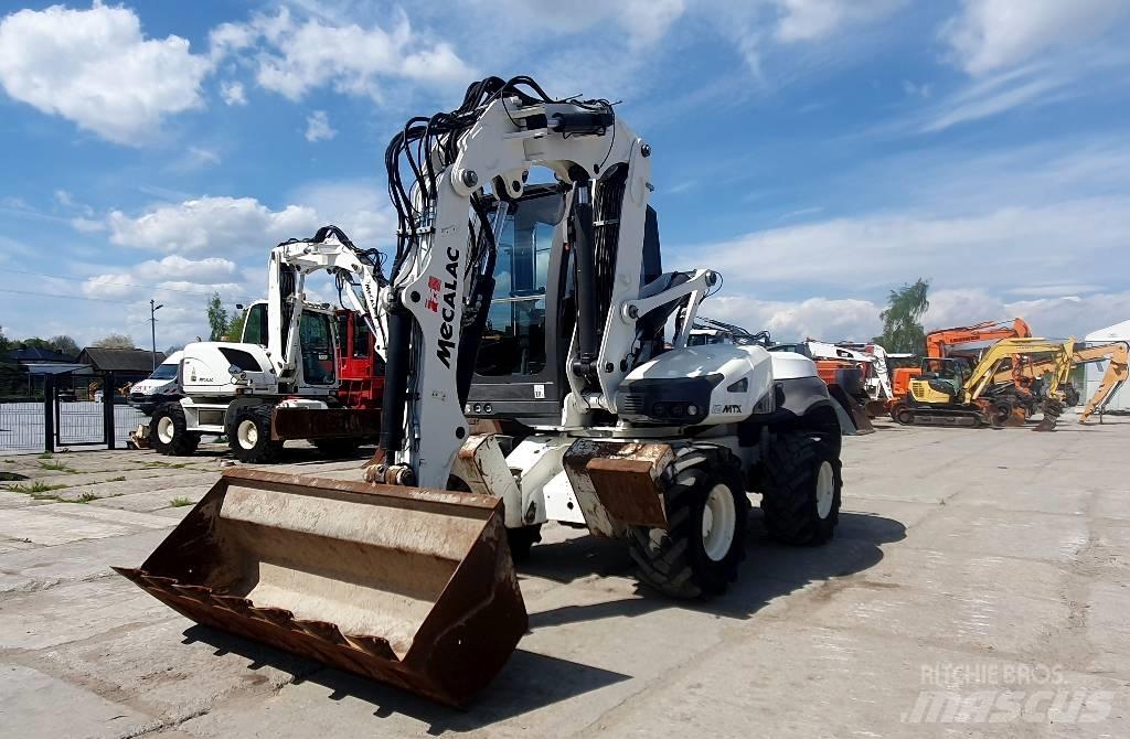 Mecalac 12 M TX Колісні екскаватори