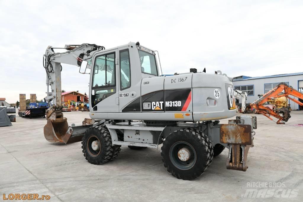 CAT M 313 D Колісні екскаватори