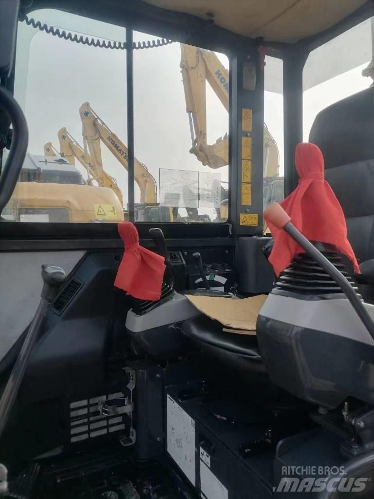 Komatsu PC56-7 Гусеничні екскаватори