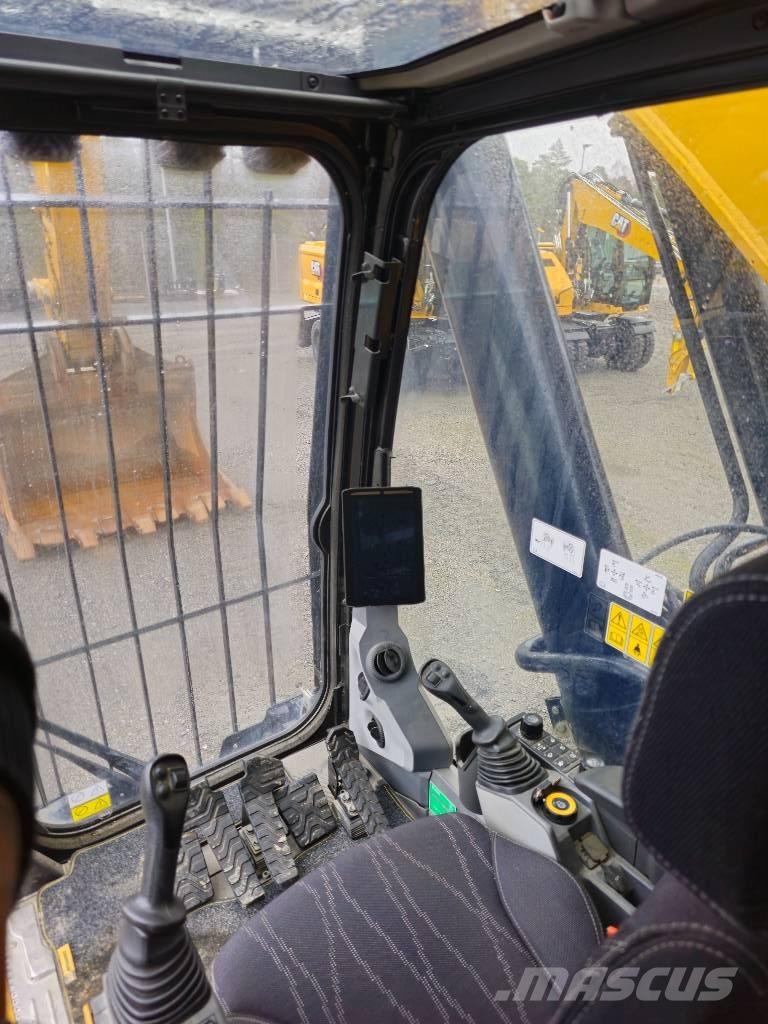 CAT 374 Гусеничні екскаватори