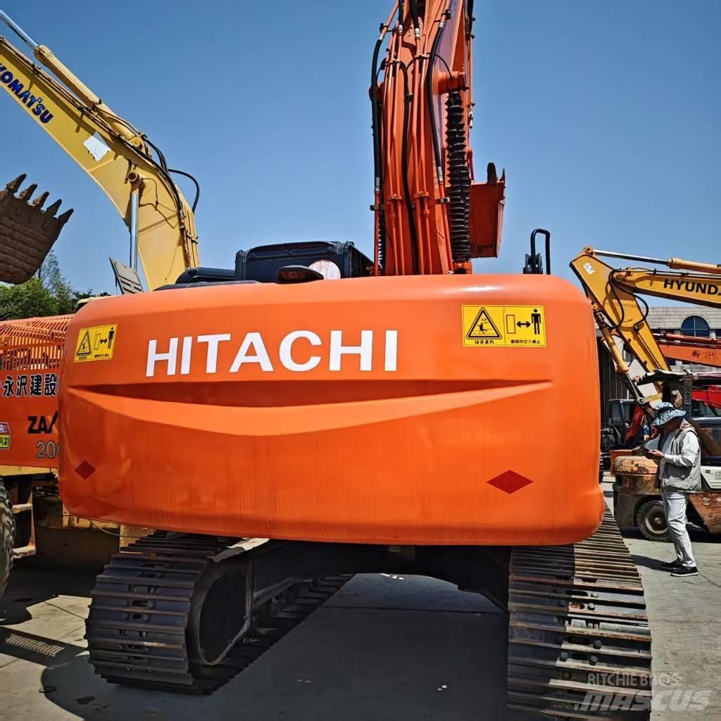 Hitachi ZX 210 Гусеничні екскаватори