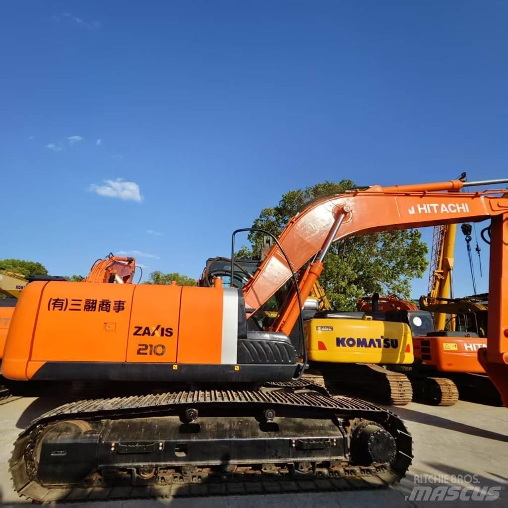 Hitachi ZX 210 Гусеничні екскаватори
